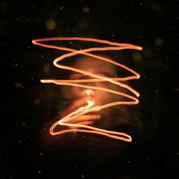 Illustration of human lungs with glowing light representing air flow.